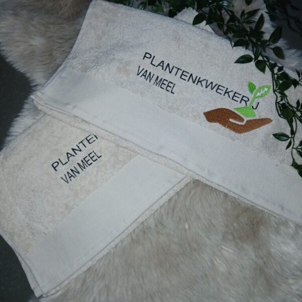 Handdoek met bedrijfslogo.